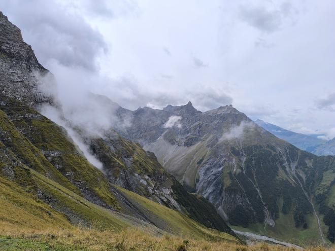Cloudy view from the pass to the surrounding landscape